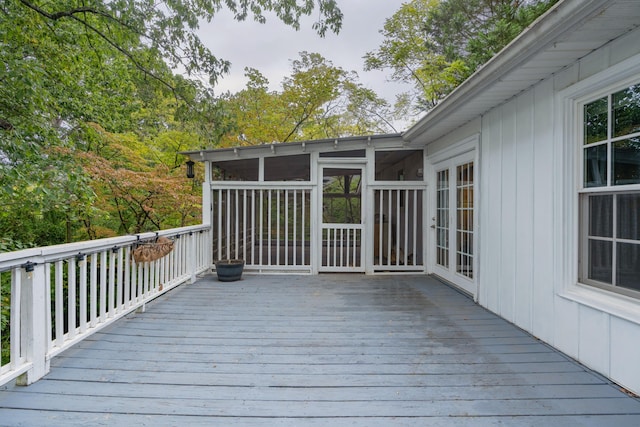 deck featuring a sunroom