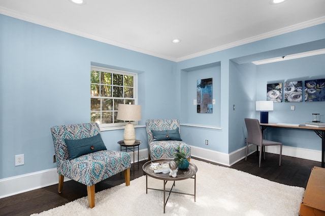 sitting room featuring crown molding and wood-type flooring