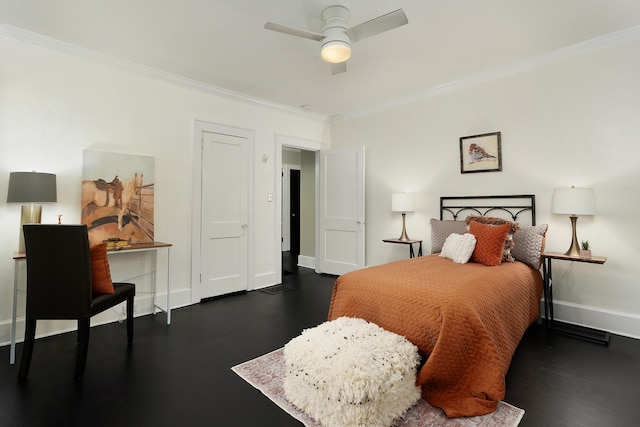 bedroom with crown molding, dark hardwood / wood-style floors, and ceiling fan