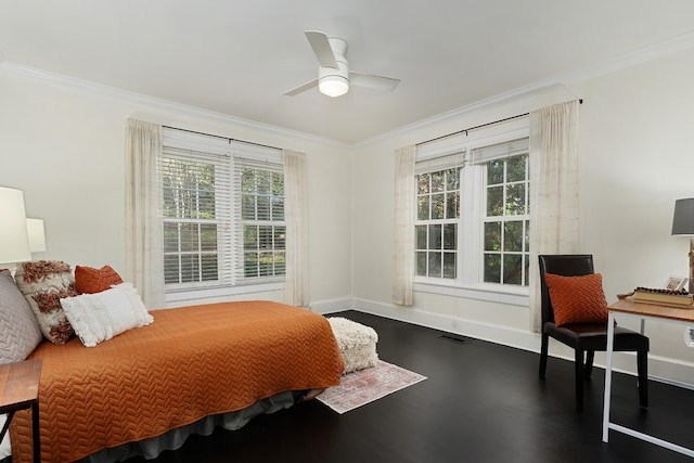 bedroom with multiple windows, crown molding, and ceiling fan