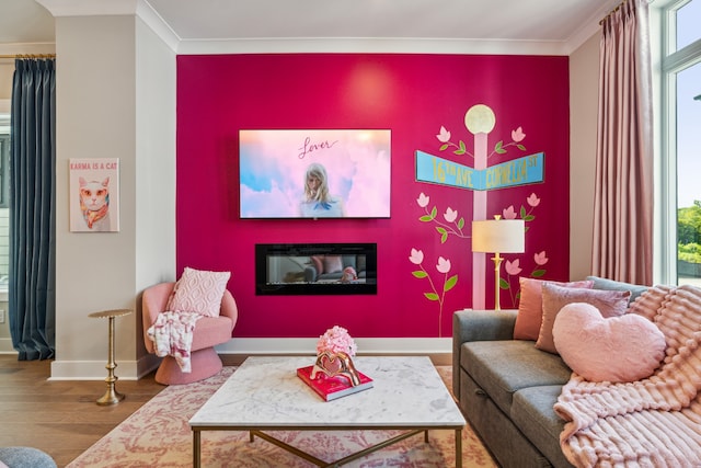 living room with hardwood / wood-style flooring and ornamental molding