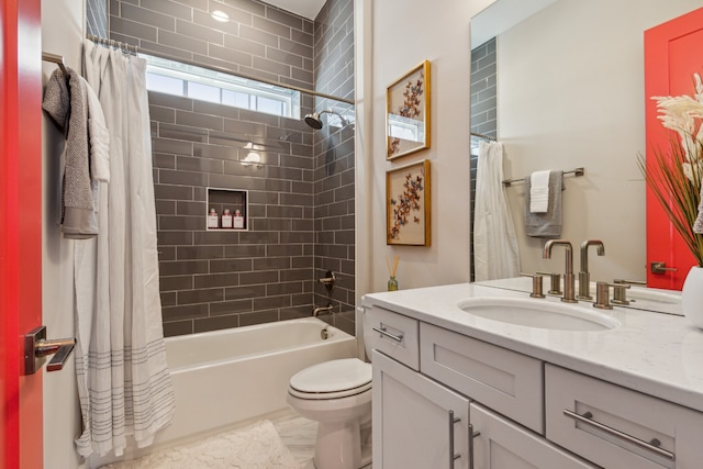 full bathroom featuring vanity, toilet, and shower / bathtub combination with curtain