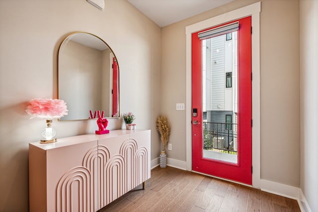 foyer entrance featuring hardwood / wood-style flooring