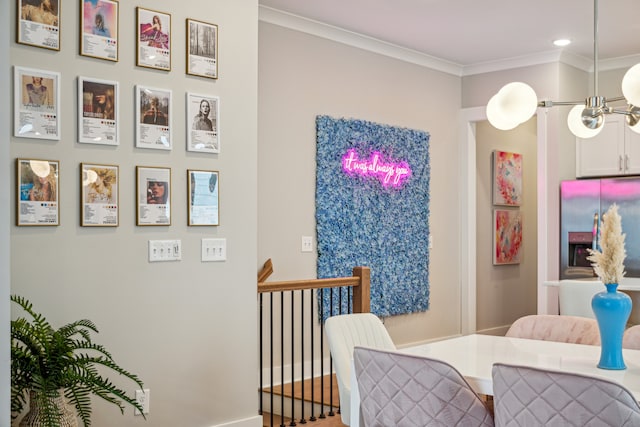 dining room featuring ornamental molding