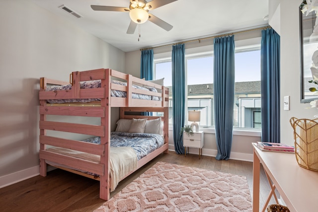 bedroom with hardwood / wood-style flooring and ceiling fan