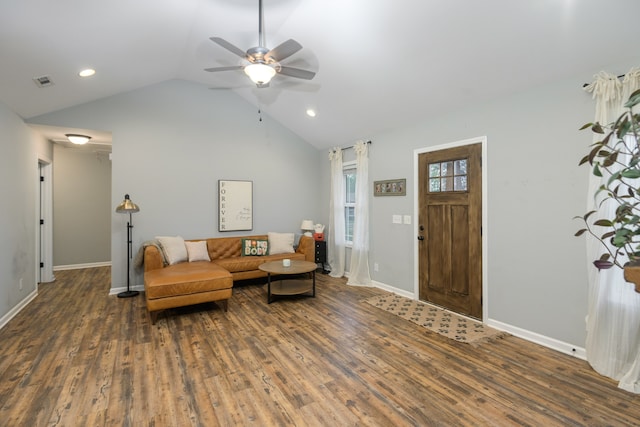 living room featuring lofted ceiling, ceiling fan, and dark hardwood / wood-style floors