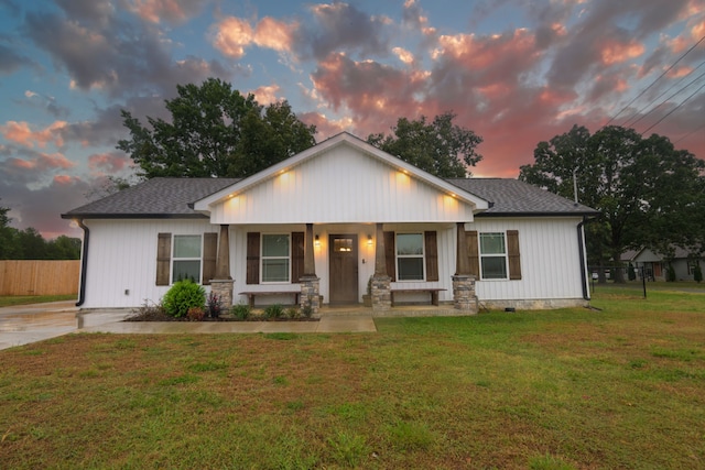 view of front of house with a lawn