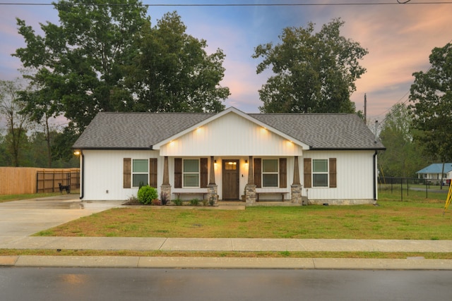 craftsman house with a yard