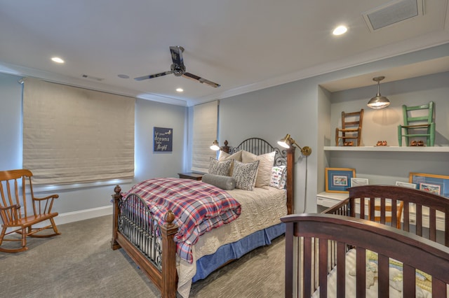 carpeted bedroom featuring ceiling fan and crown molding