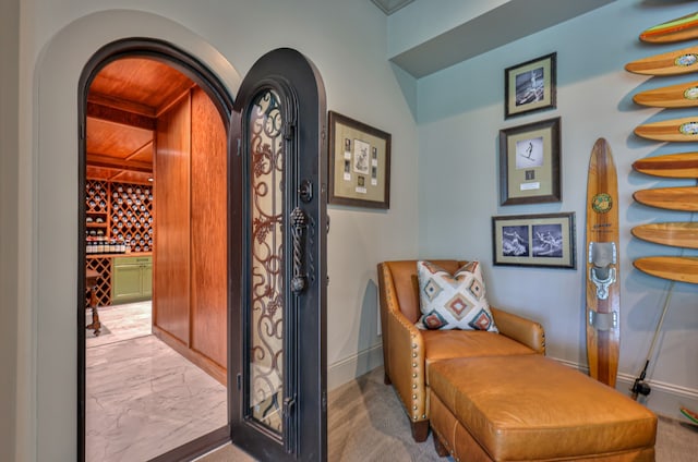 living area featuring wood ceiling