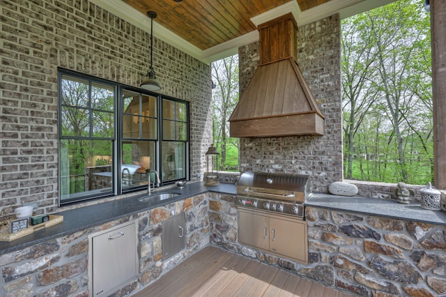 view of patio featuring area for grilling, grilling area, and sink