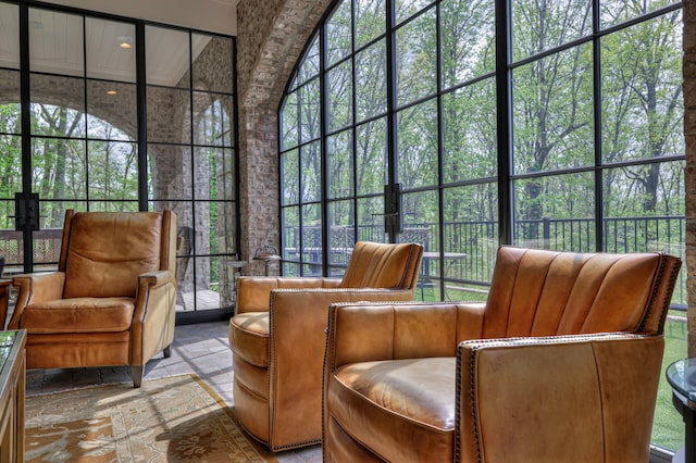 sunroom with beam ceiling