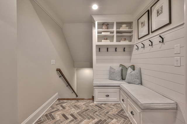 mudroom featuring crown molding