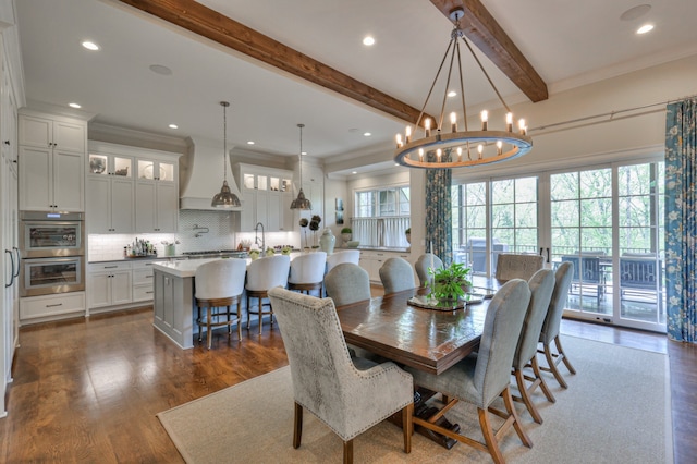 dining area featuring a notable chandelier, beam ceiling, crown molding, and dark hardwood / wood-style flooring