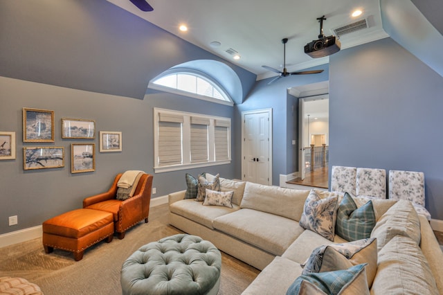 living room with ceiling fan, light colored carpet, and high vaulted ceiling