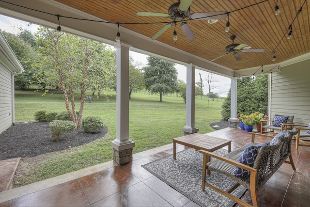 view of patio / terrace featuring ceiling fan