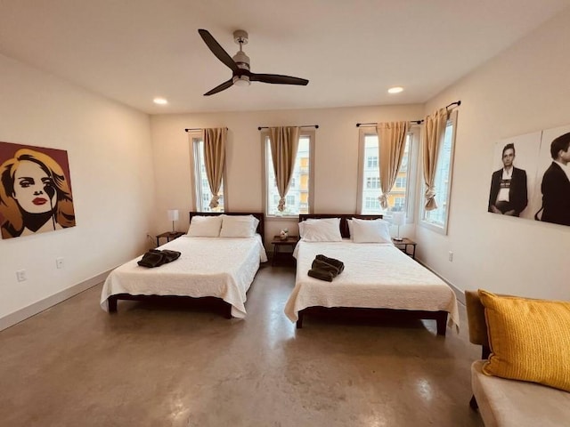 bedroom with baseboards, concrete floors, recessed lighting, and a ceiling fan