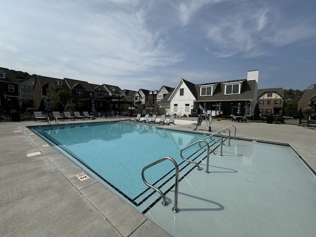 view of swimming pool featuring a patio