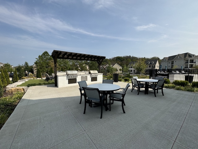 view of patio with a grill and exterior kitchen