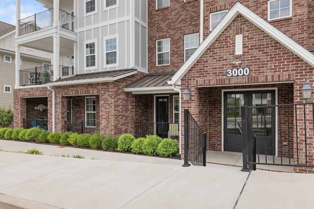 property entrance with a balcony