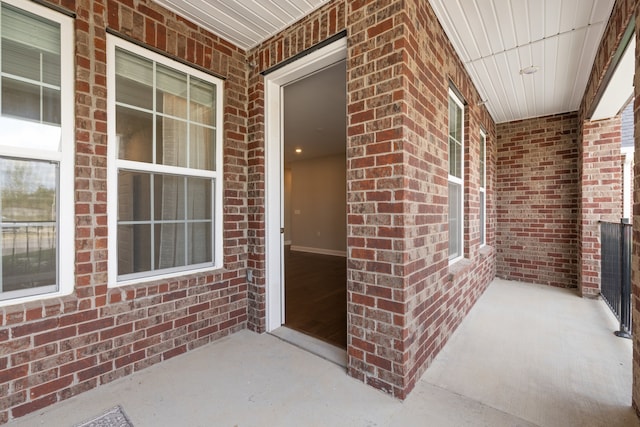 entrance to property with covered porch