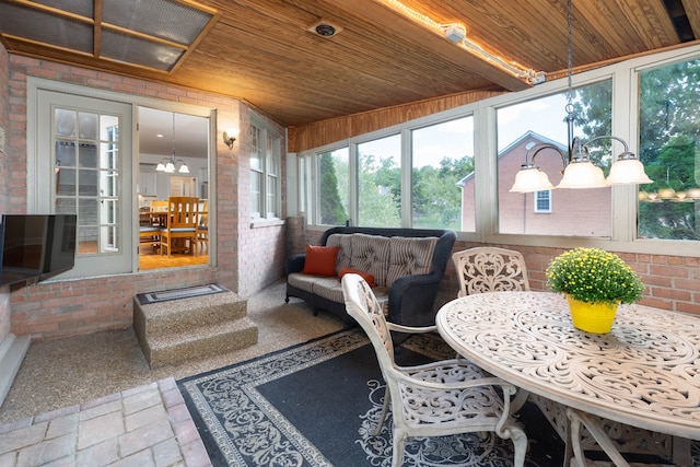 sunroom with wooden ceiling