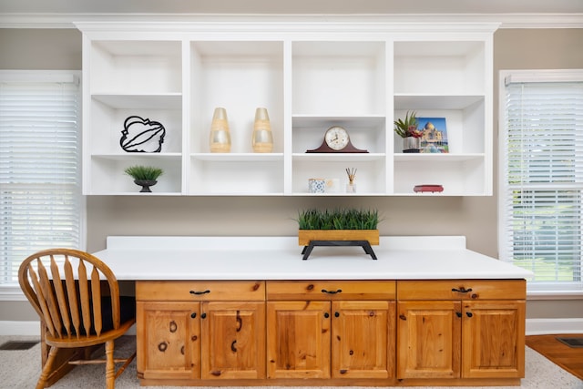 office area with ornamental molding