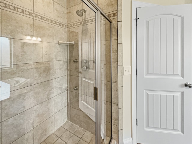 bathroom with an enclosed shower