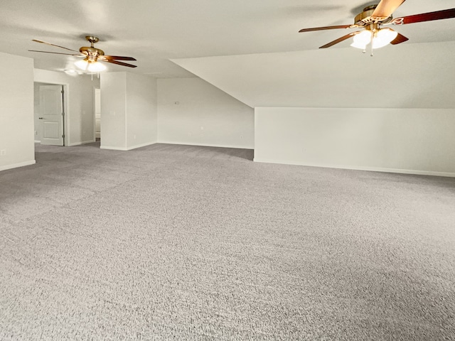 bonus room featuring ceiling fan, carpet floors, and lofted ceiling