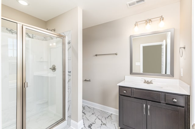 full bathroom featuring vanity, visible vents, baseboards, marble finish floor, and a shower stall