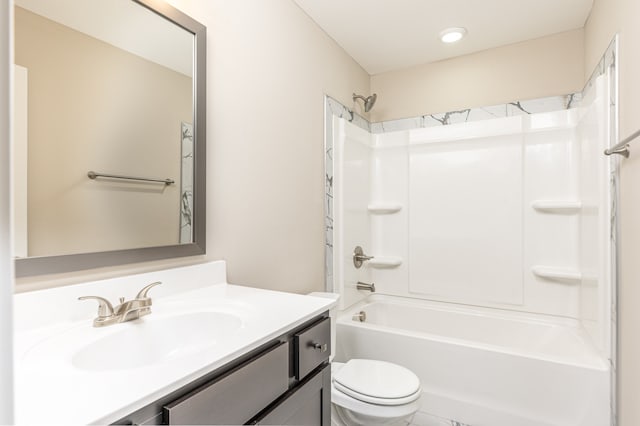 full bathroom with vanity,  shower combination, and toilet