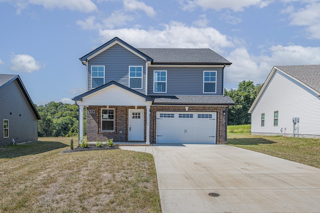 view of front facade with a garage and a front yard