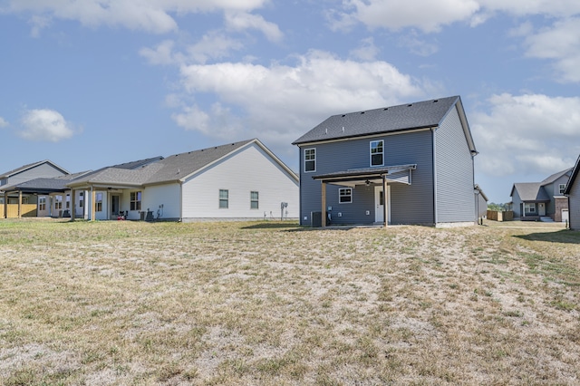 rear view of property with central air condition unit