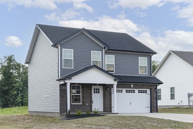 view of front of property featuring brick siding, a shingled roof, a garage, driveway, and a front lawn