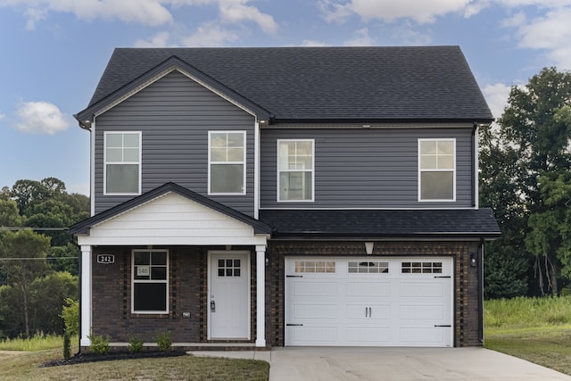 view of front of home with a garage, driveway, a shingled roof, and brick siding