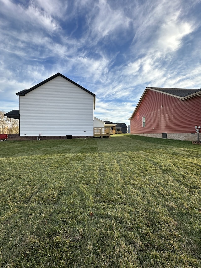 view of yard featuring a deck