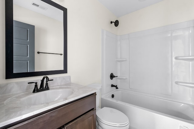 full bathroom featuring shower / washtub combination, toilet, and vanity