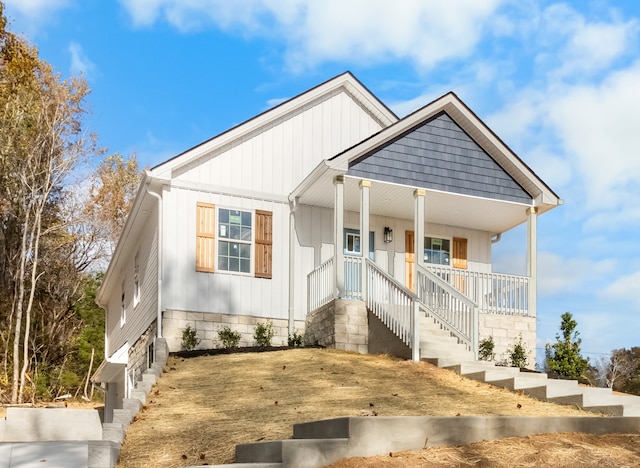 view of front of home featuring covered porch