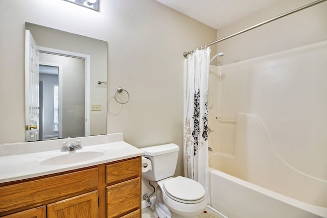 full bathroom with vanity, toilet, and shower / tub combo