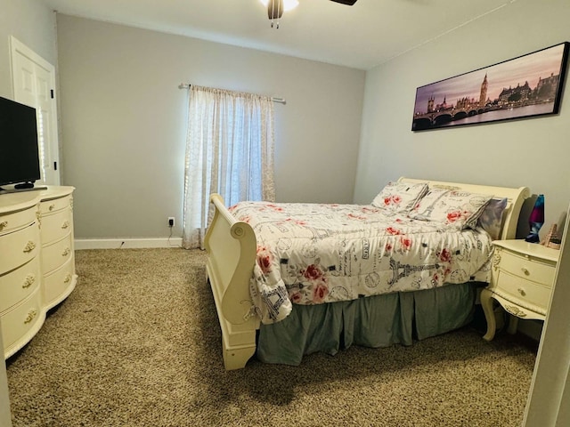 bedroom featuring ceiling fan and carpet floors