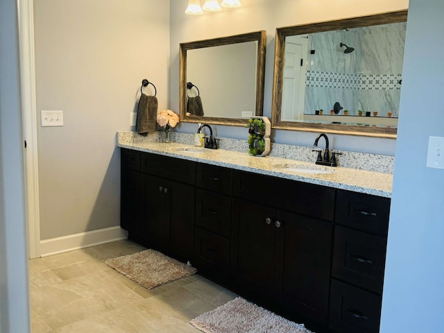 bathroom with vanity and a shower