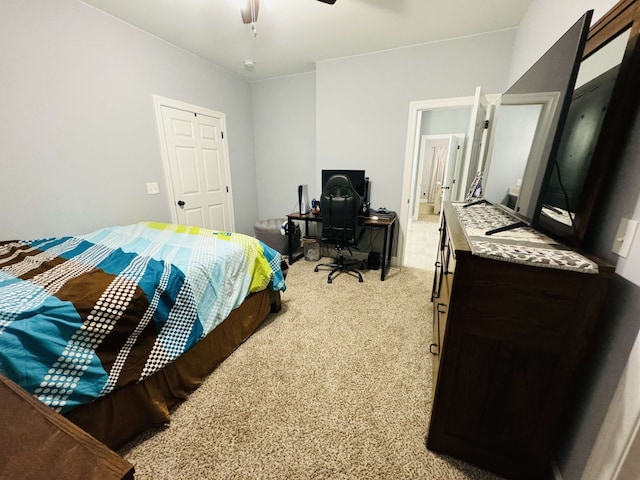 bedroom featuring ceiling fan and light colored carpet