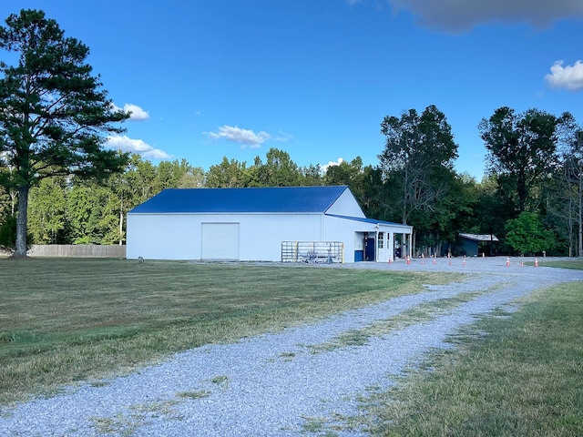 view of outdoor structure featuring a yard