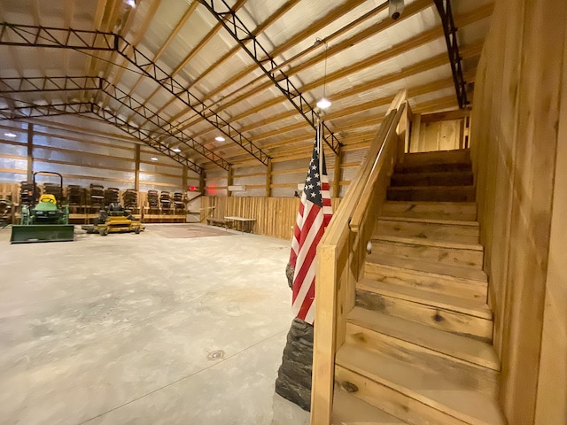 garage featuring wooden walls