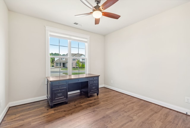 office space with dark hardwood / wood-style floors and ceiling fan