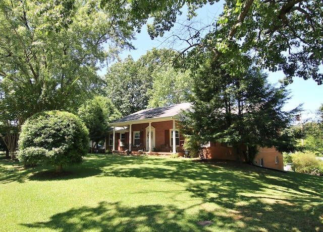 view of yard with a porch