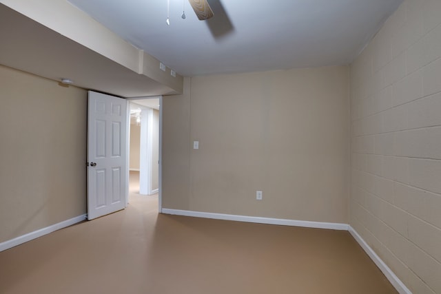 empty room with concrete floors and ceiling fan