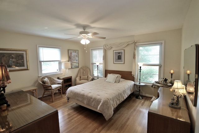 bedroom featuring ceiling fan and hardwood / wood-style floors