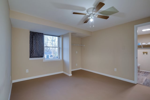 unfurnished bedroom with ceiling fan, a closet, and carpet