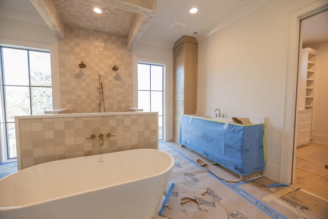 bathroom featuring separate shower and tub and tile walls